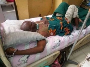 A prisoner taken to the hospital at the verge of his sickness, chained to his hospital bed though he could barely sit up. He died a chained on that bed.